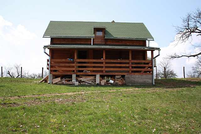 vedere din fata Căsuță de vacanță din lemn si casuta pentru copii
